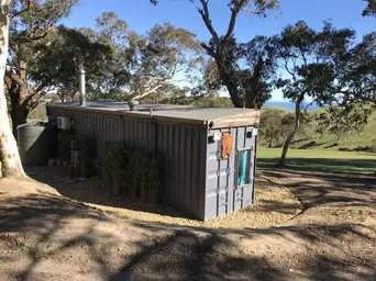 https://www.livinginacontainer.com/wp-content/uploads/2020/09/She-Herself-Designed-and-Built-Her-Tiny-House-with-a-Recycled-Shipping-Container-in-Australia-17.jpg?ezimgfmt=rs:342x257/rscb9/ng:webp/ngcb9