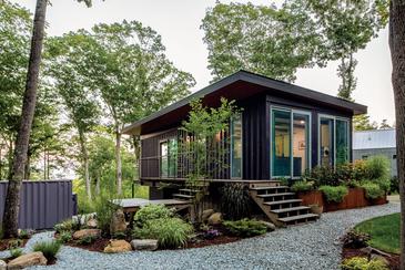 Liz and Todd's Glamorous Purple Container House in Northport